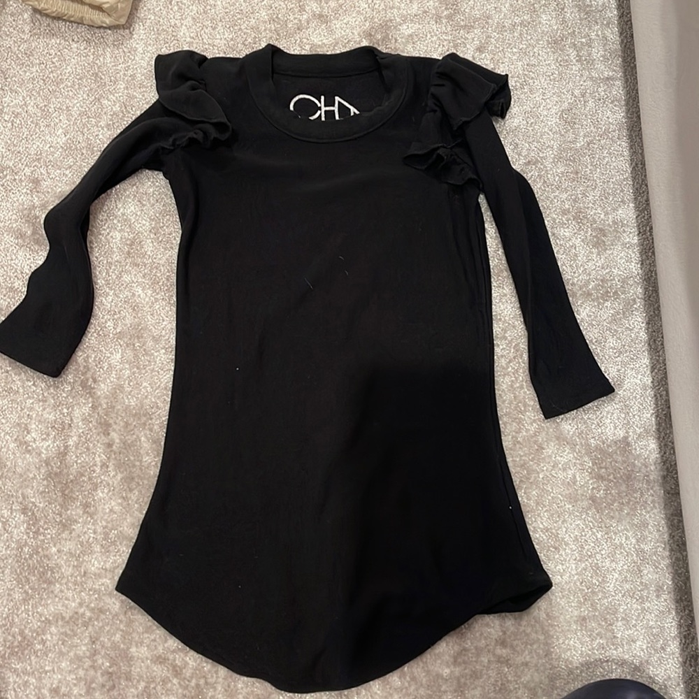 Kids black chaser dress with ruffle shoulder and scoop bottom